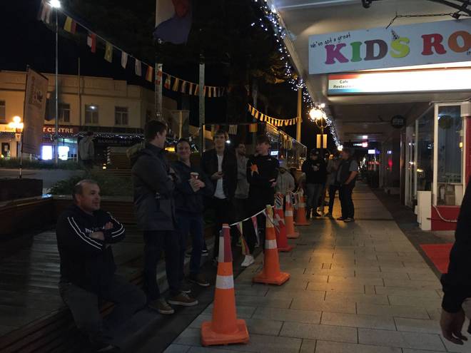 The midnight queue outside the Barbershop Co. in Birkenhead, Auckland. Photo: Chelsea Boyle/NZ...