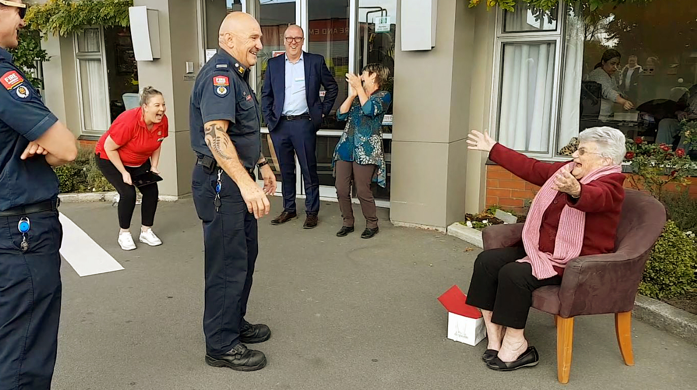 Rima Arney turned 102 on Friday. Firefighters, including Richard Hurst-Long from the Spreydon...