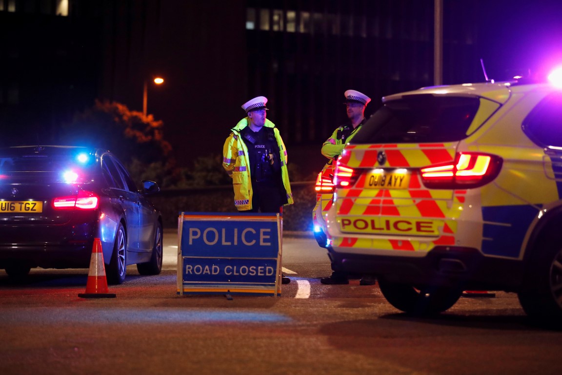 Police at a cordon in Reading following the attack. Photo: Reuters