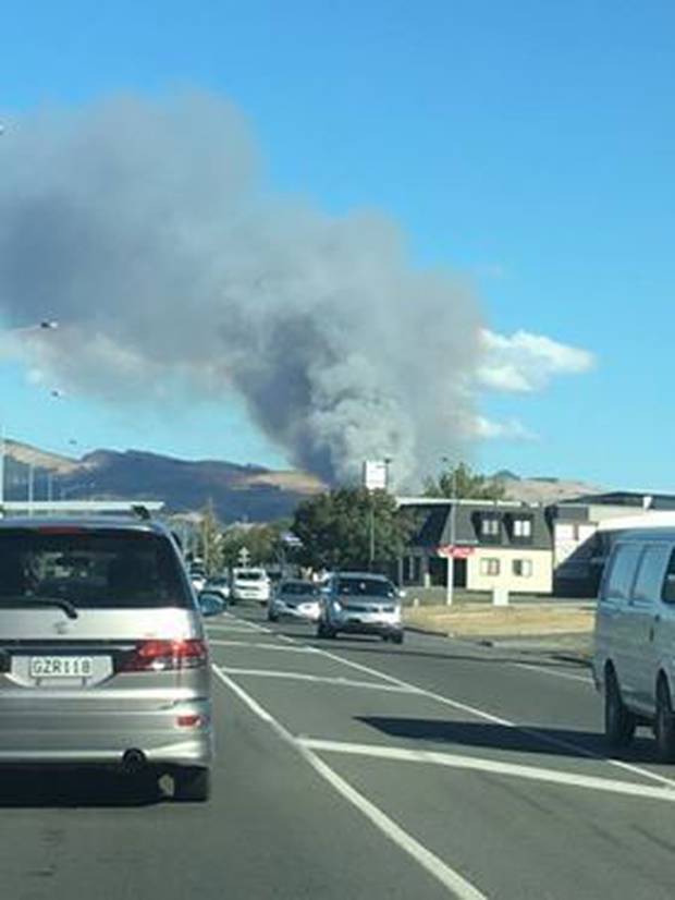 The fire can be seen across Christchurch. Photo / Chrissie Tait