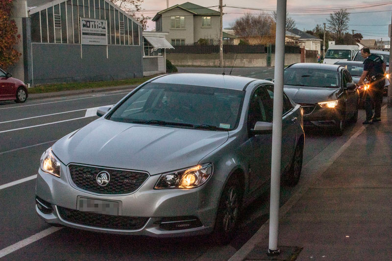 CONVOY: Police meet before executing a search warrant in Woolston as part of Operation Prodigy....