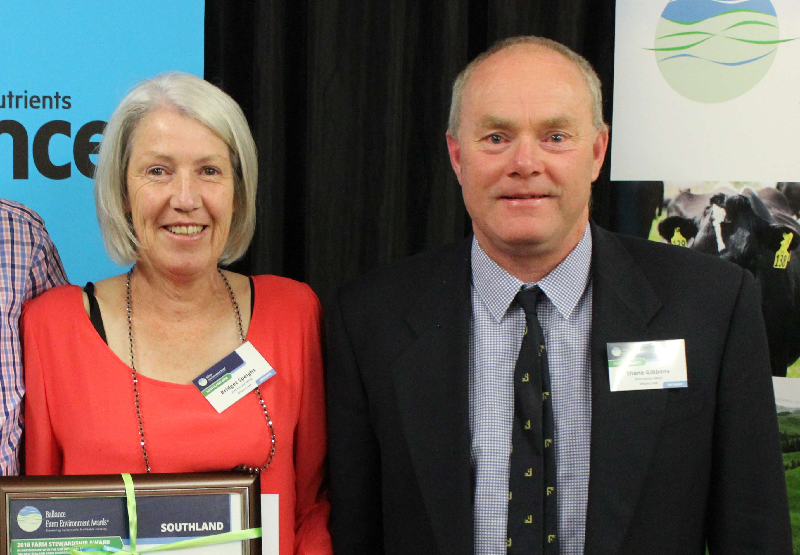 Shane Gibbons and his partner Bridget Speight  being presented with the QEII National Trust and...