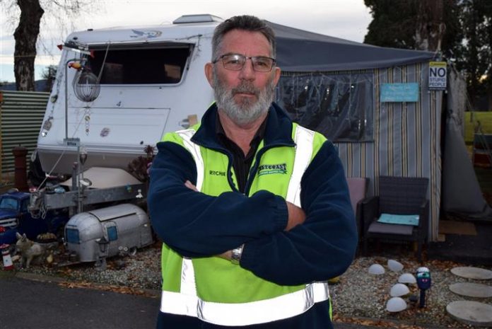 Mosgiel Caravan Park manager and tenant Richard Wallis is refusing to leave his home despite its...