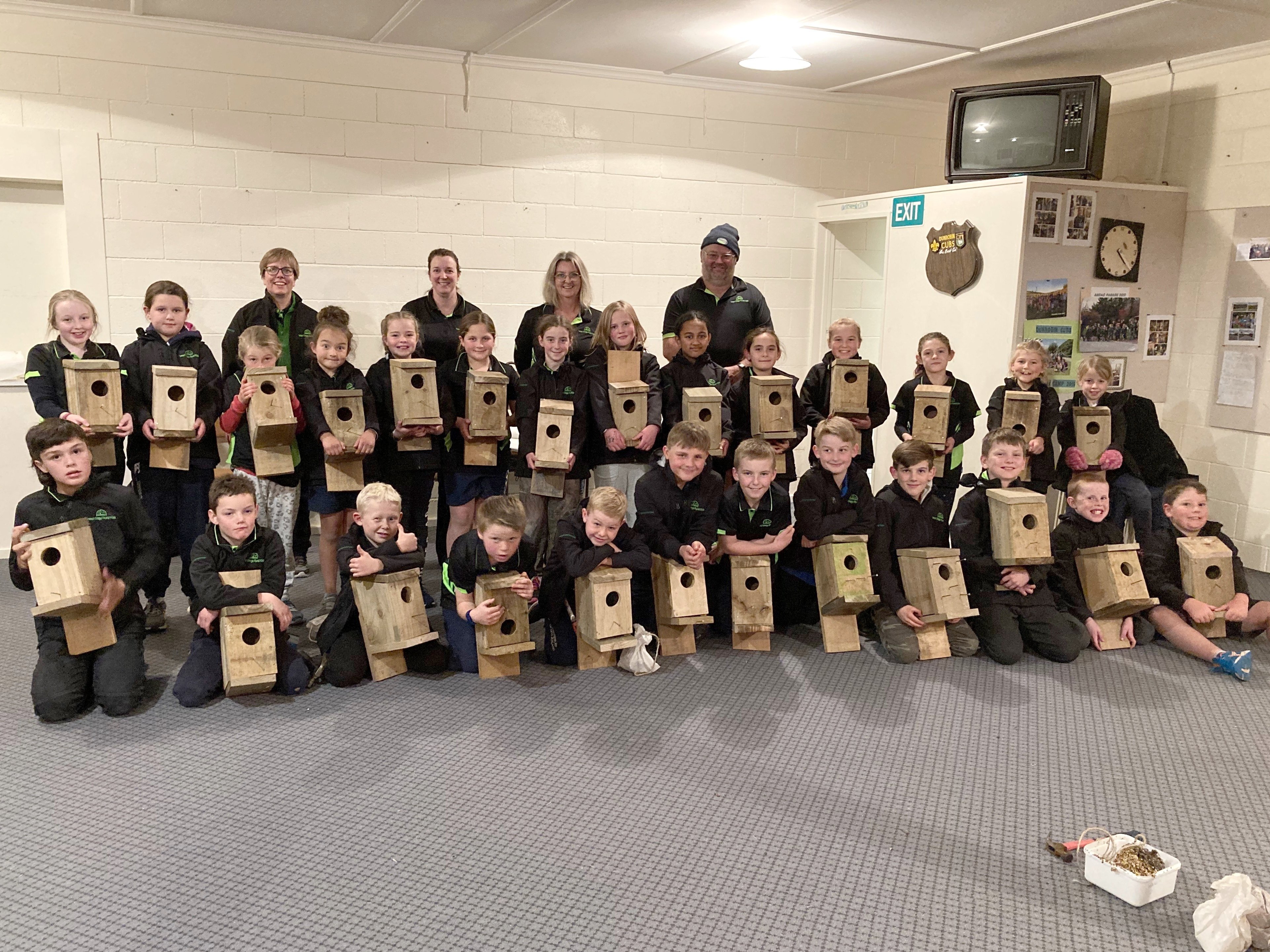 West Otago Rural Kids members and adult leaders show off their bird boxes 
...