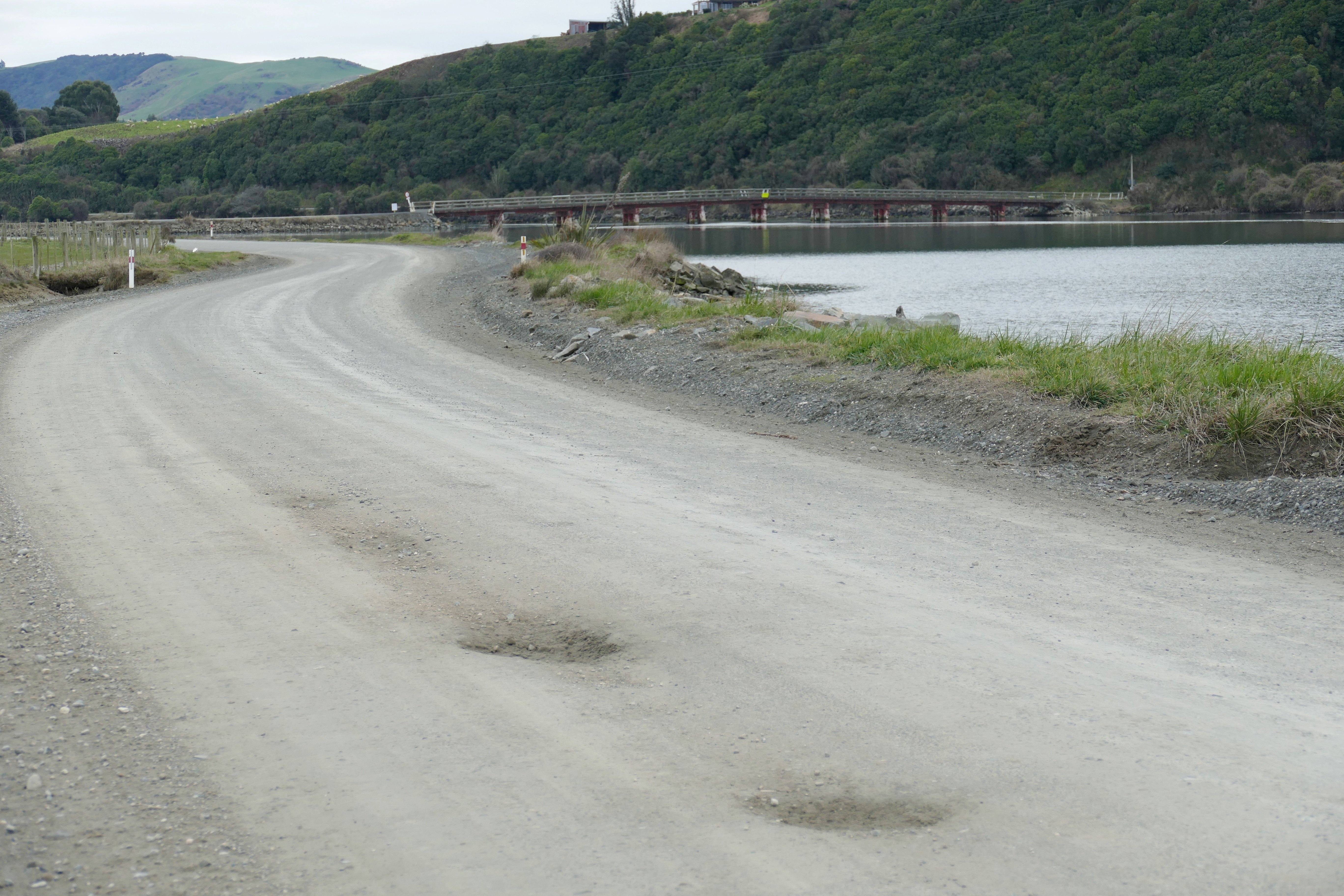 Potholes on Hinahina Rd leading to Hinahina Bridge, in the Catlins. PHOTOS: RICHARD DAVISON