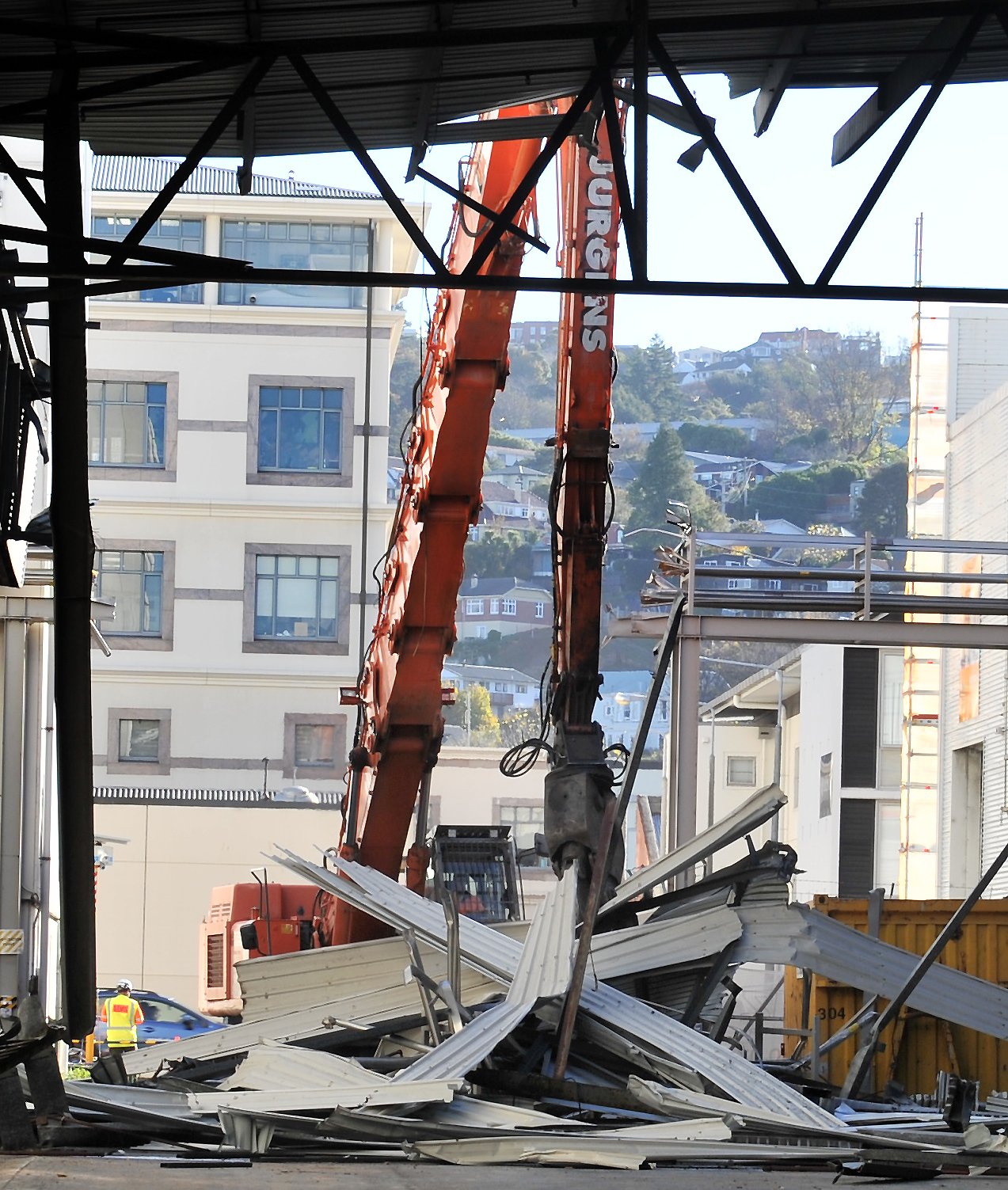 Part of the canopy of the former Cadbury warehouse is pulled down on Saturday, as work begins on...