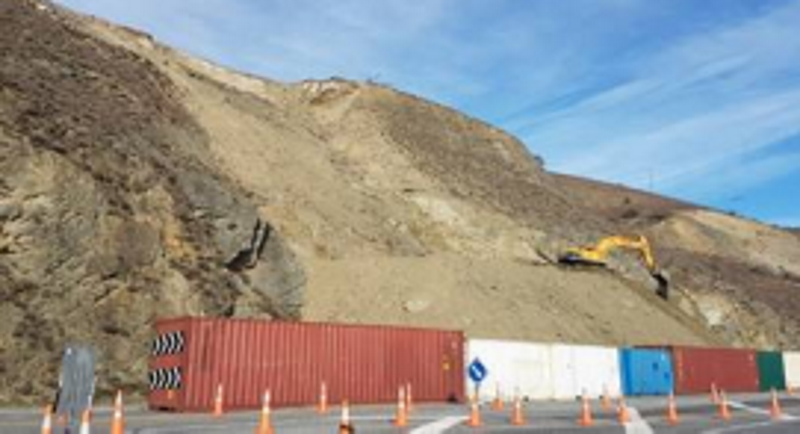 A digger cleans up part of the site Photo: NZTA