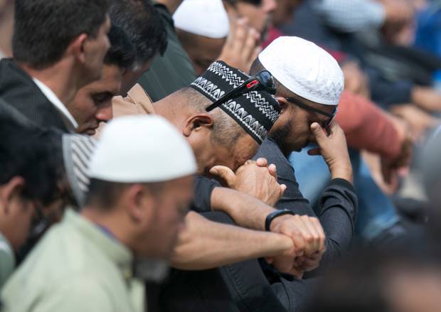 Muslim worshippers pray during the Friday prayer held in Hagley Park. Photo: Alan Gibson