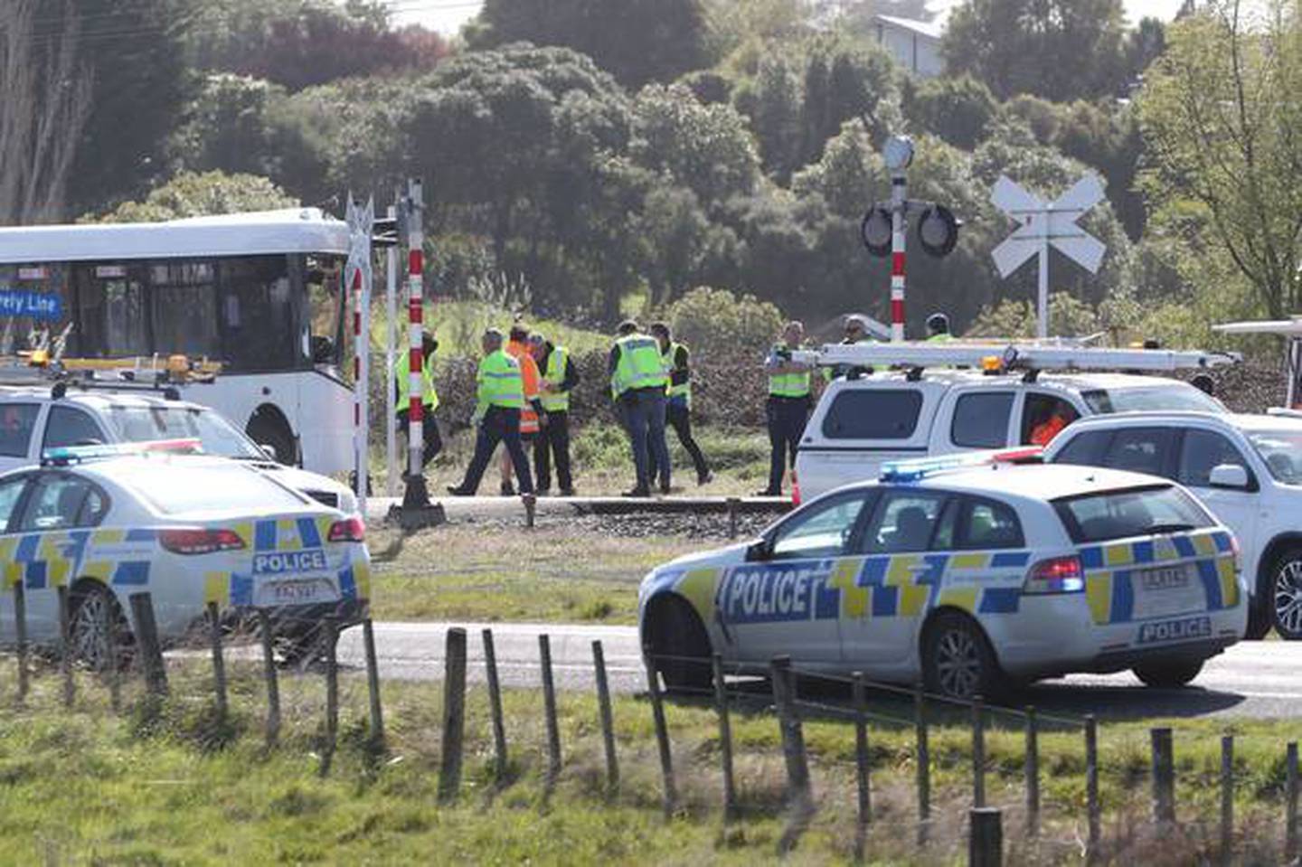 Emergency services at the crash scene yesterday. Photo: NZ Herald