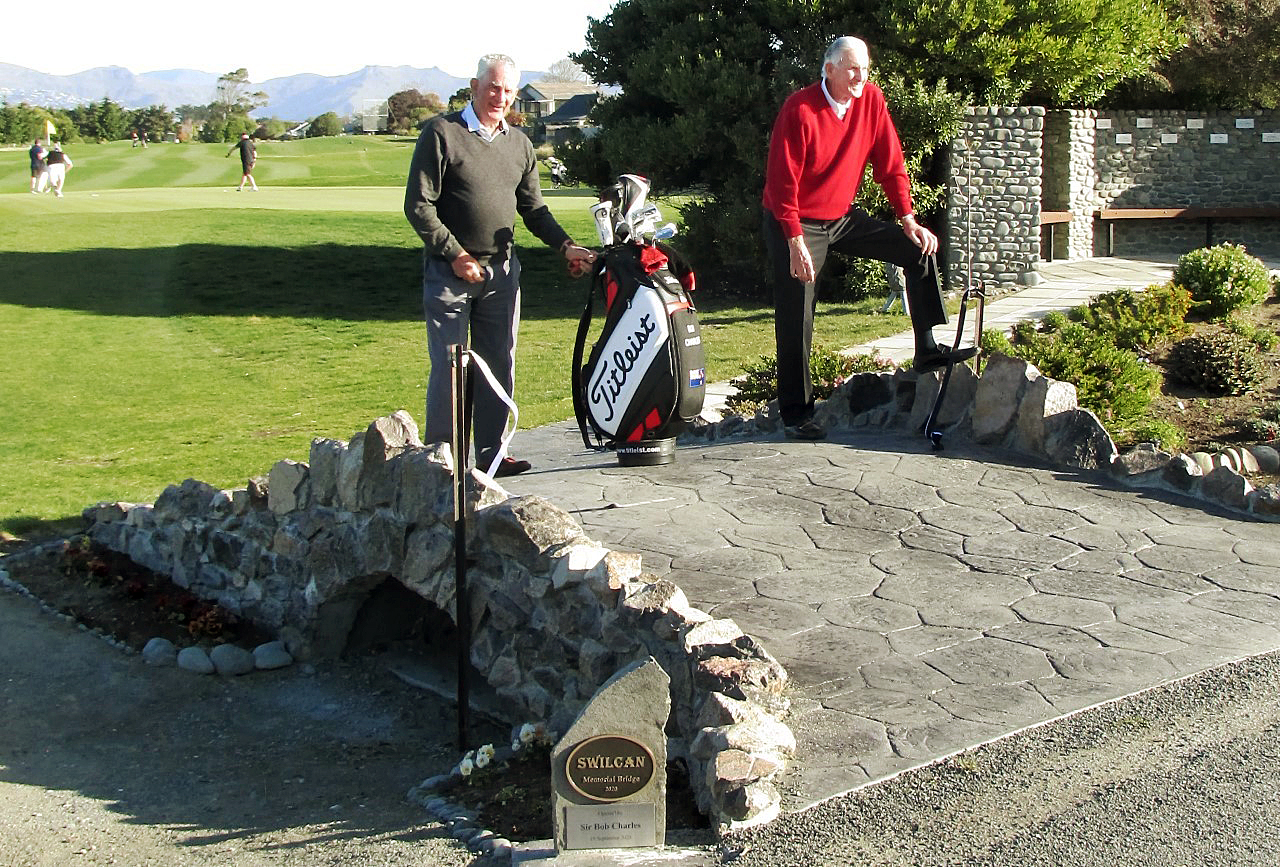 Ross Gourley and Sir Bob Charles on a replica of the famous St Andrews Swilcan Bridge, built by...