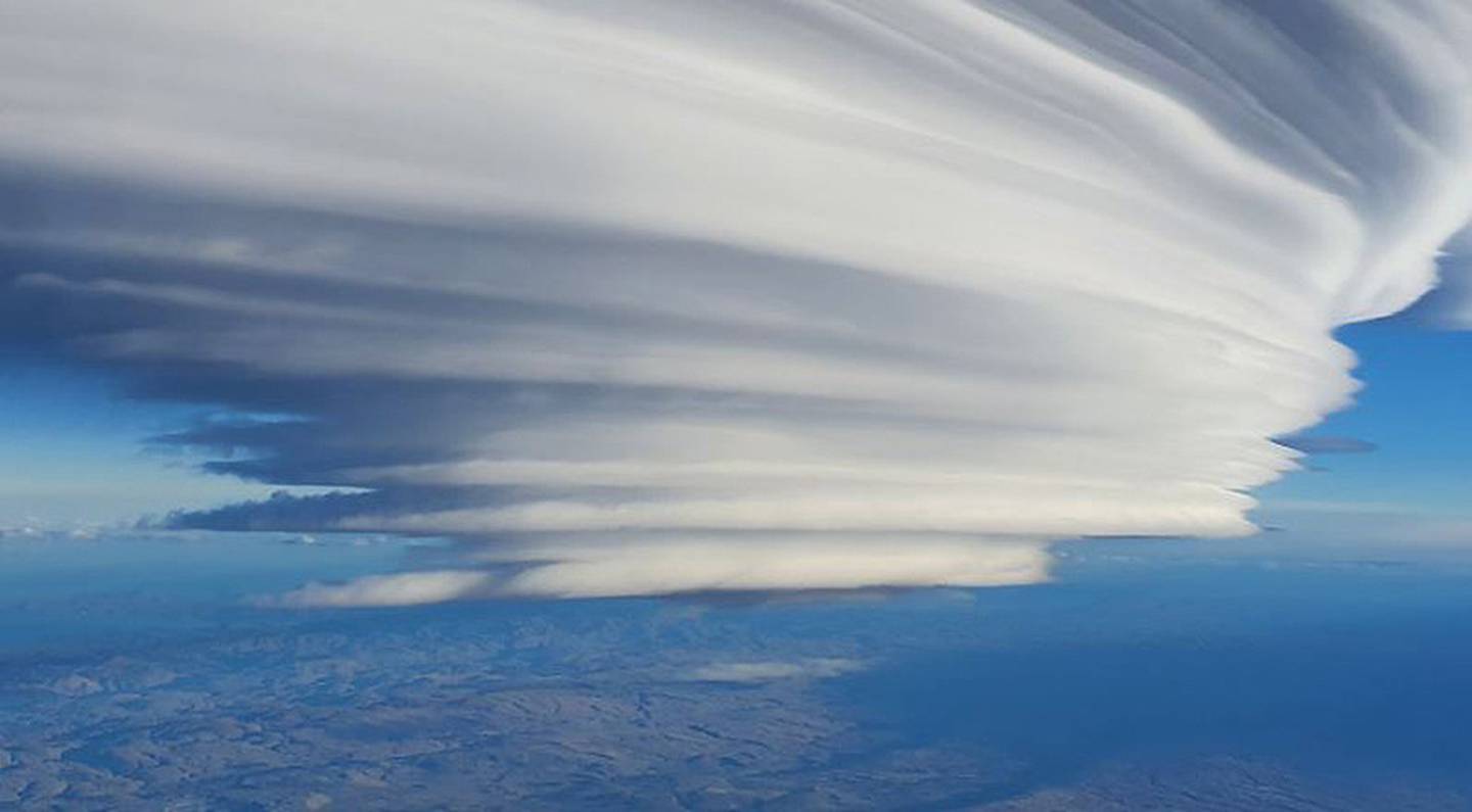 Pilot Geoff Beckett captured this incredible lenticular cloud over the South Island on the...