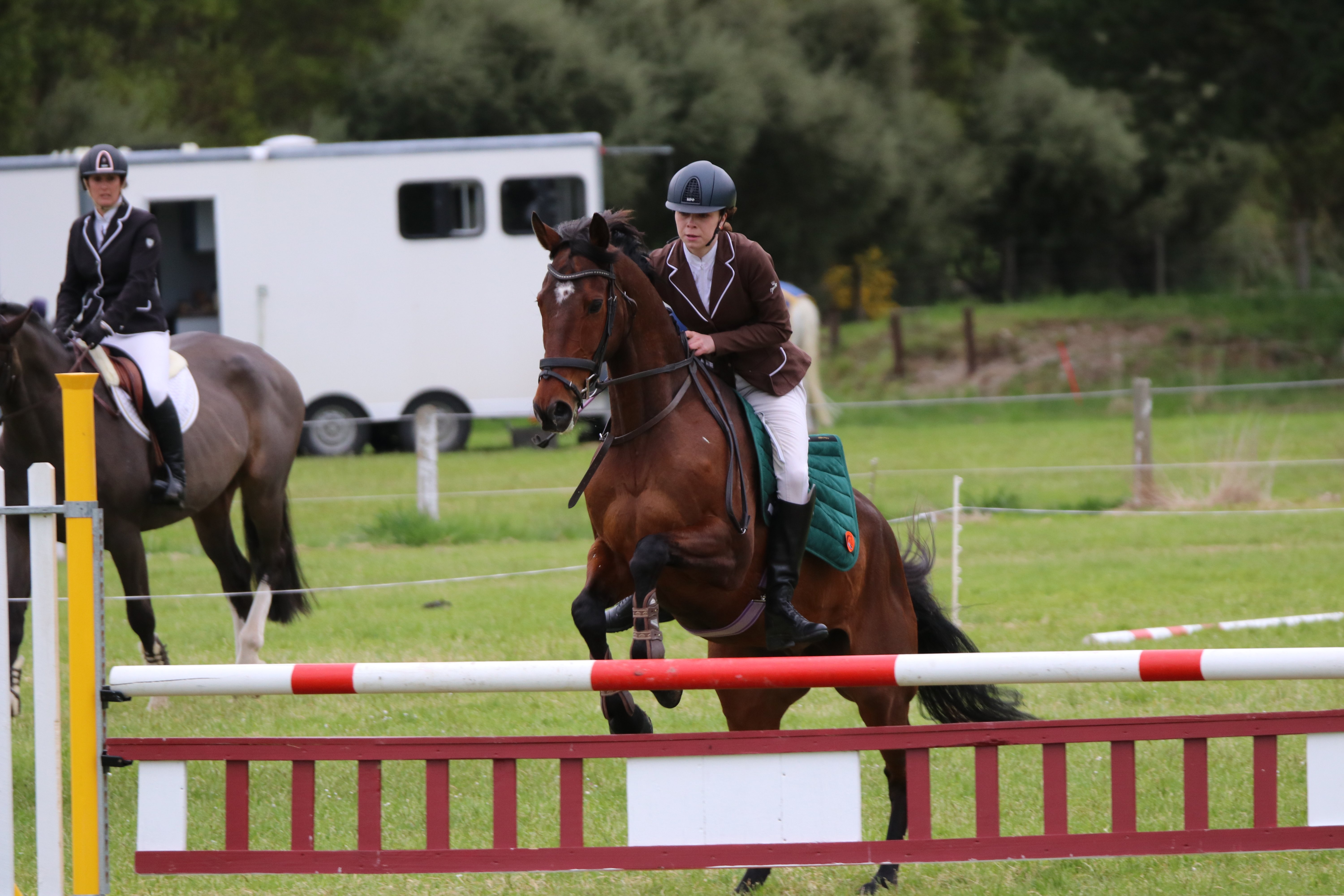 Northern Southland Pony Club senior coach Aleina Beer, riding her horse Peta Pan, competes in the...