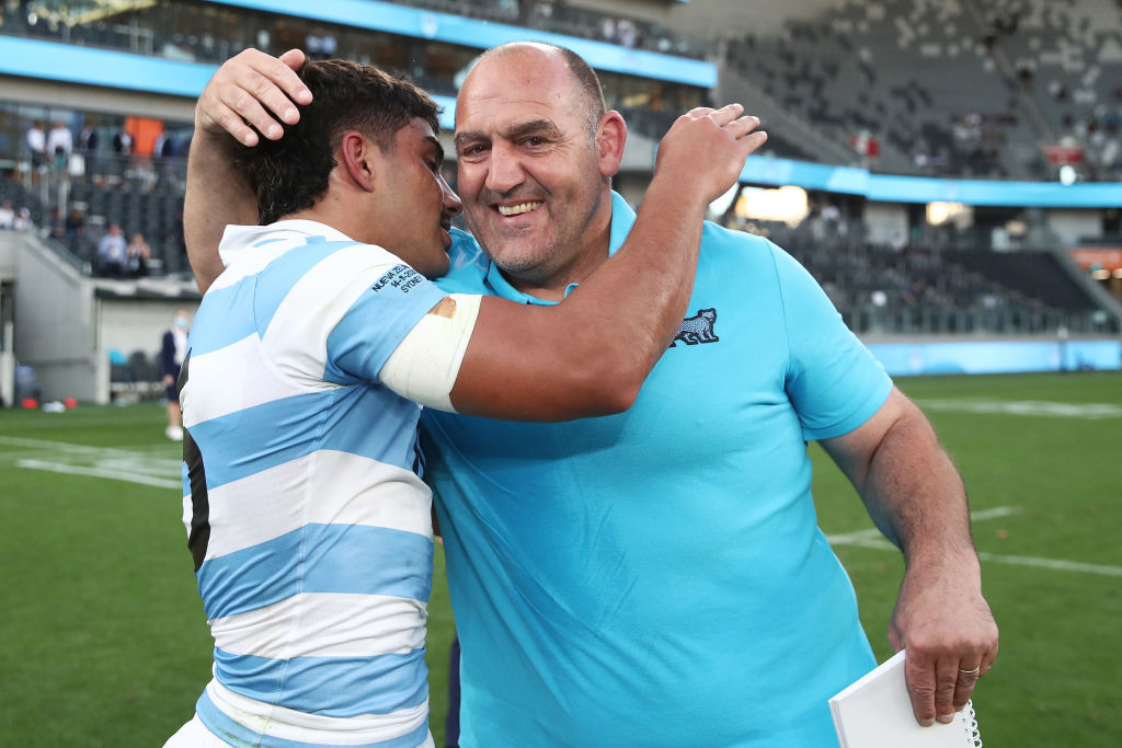 Argentina head coach Mario Ledesma celebrates with Santiago Carreras after the match. Photo: Getty 