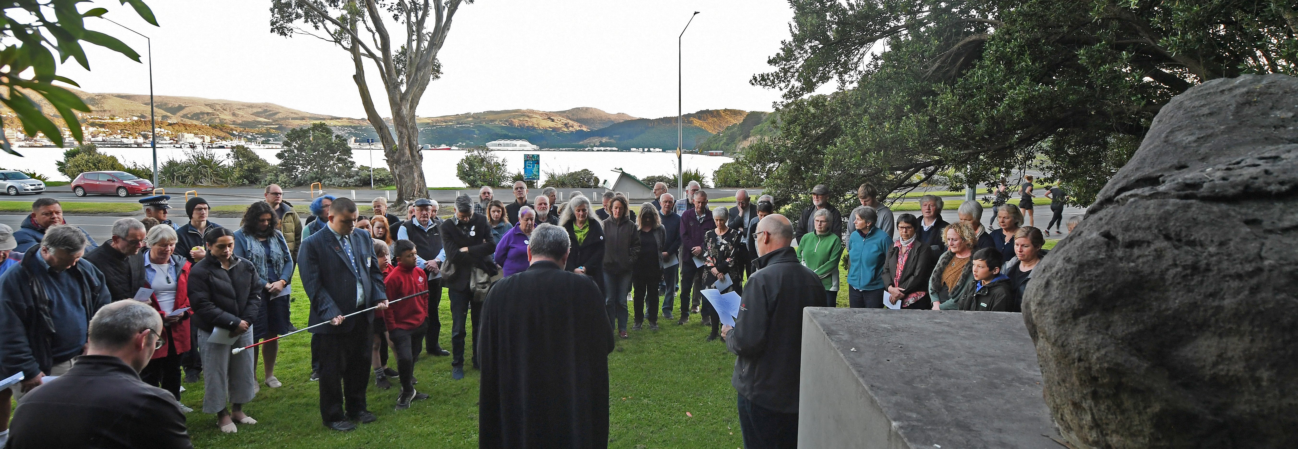 Tonga Karena, of Parihaka, speaks to those who gathered at the Rongo Stone Memorial in Andersons...