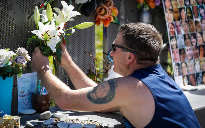 Tributes being laid to the victims of the CTV building collapse on 16 December, 2020. Photo: RNZ ...