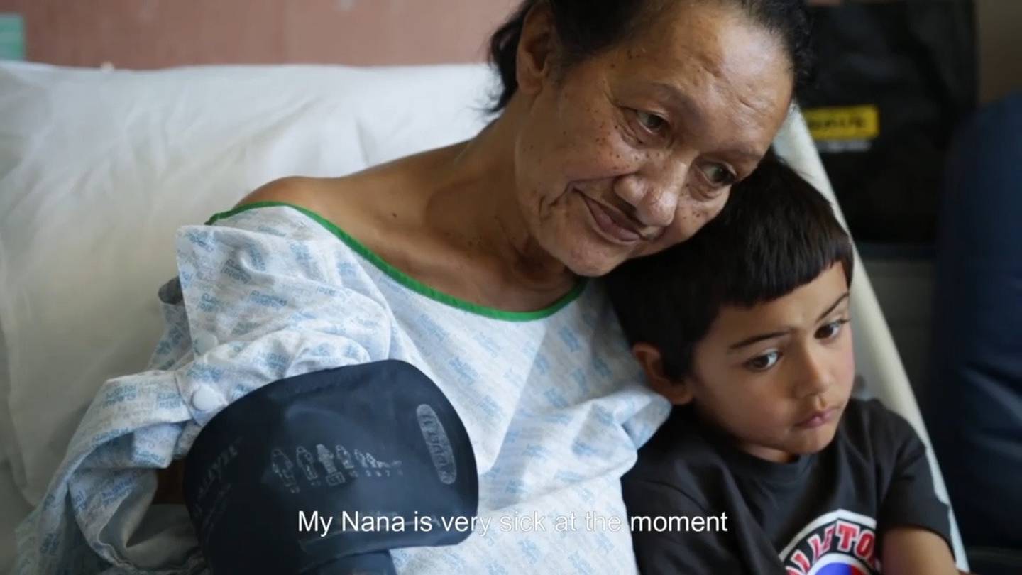 Angelou with his grandmother in the viral video. Photo: Supplied