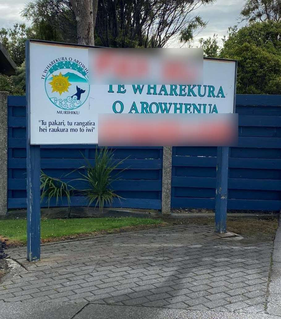 The graffiti left on the school's sign contained the n-word. Photo: Supplied