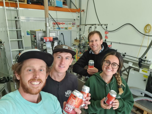 Loose Moose Canning Co owner Wesley McAllister, left, with employees Matthew Ward, Charlotte Hind...