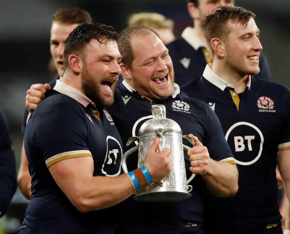 Scotland's WP Nel and Rory Sutherland celebrate with the Calcutta Cup after the match. Photo:...