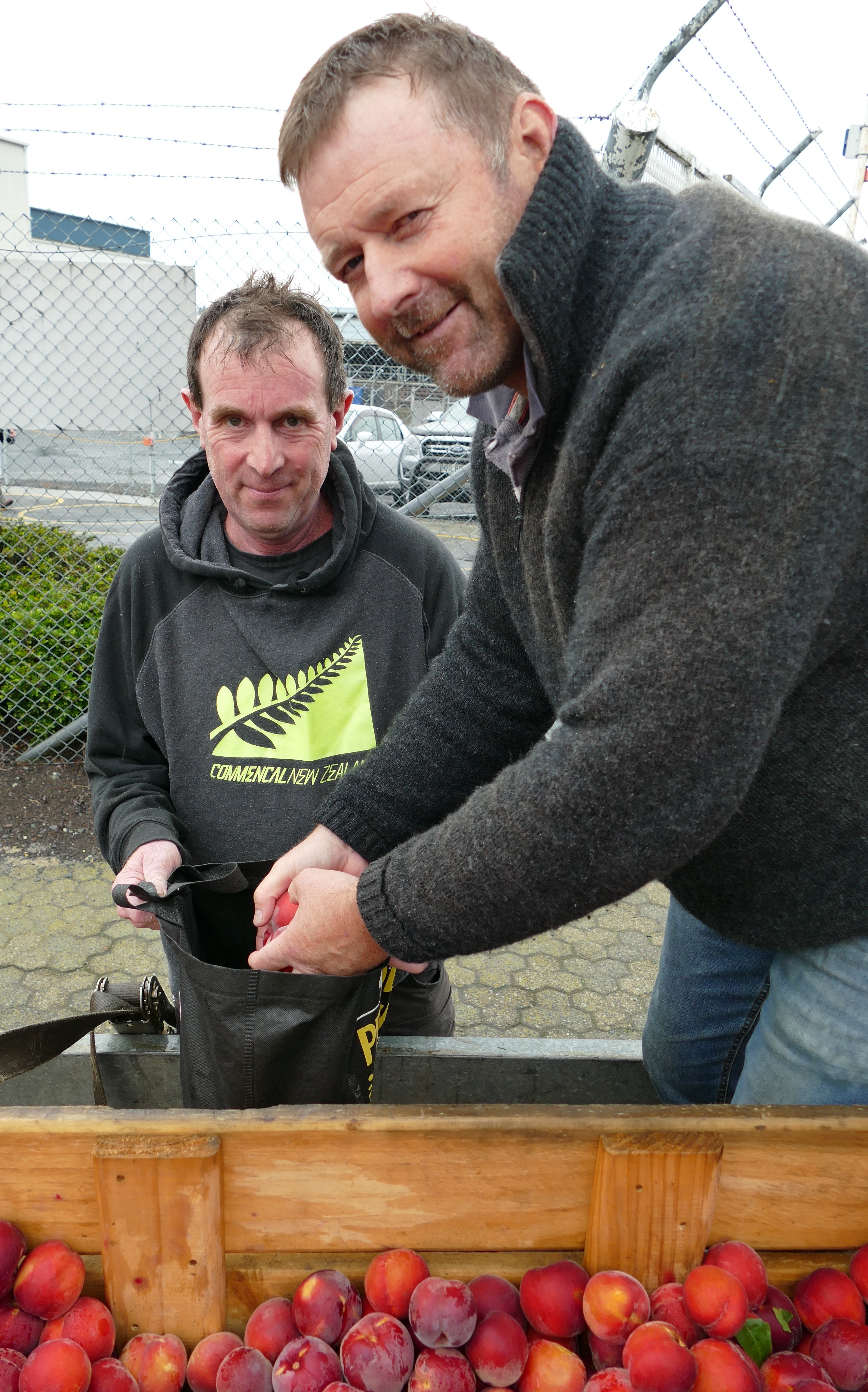 AG Proud volunteer Mark Patterson, of Lawrence, helps Silver Fern Farms beef slaughterman Nathan...