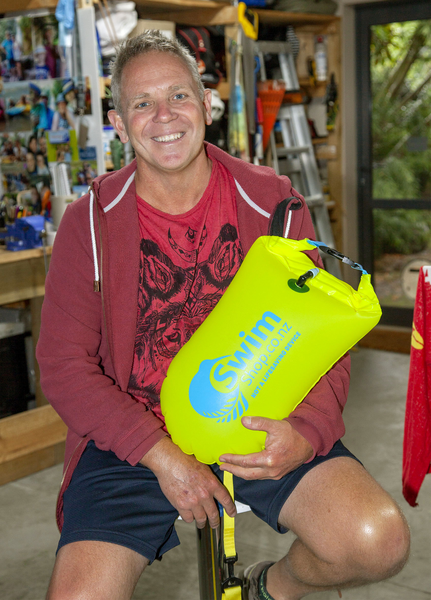 Mark Bone with an inflatable tow float used by competitors in the swim.  Photo: Geoff Sloan