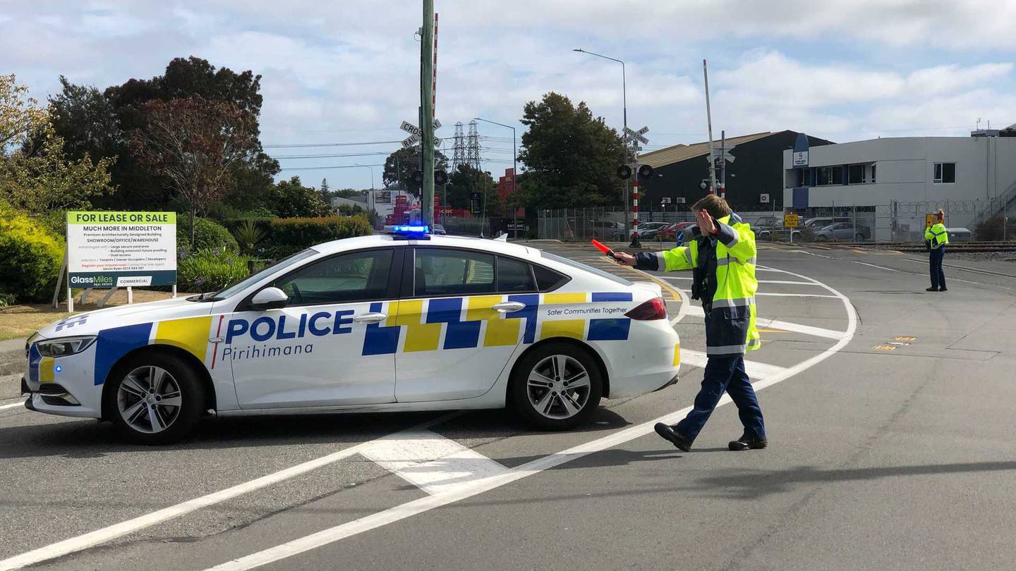 Police cordoned off Matipo St in the suburb of Riccarton. Photo: NZ Herald/Hamish Clark