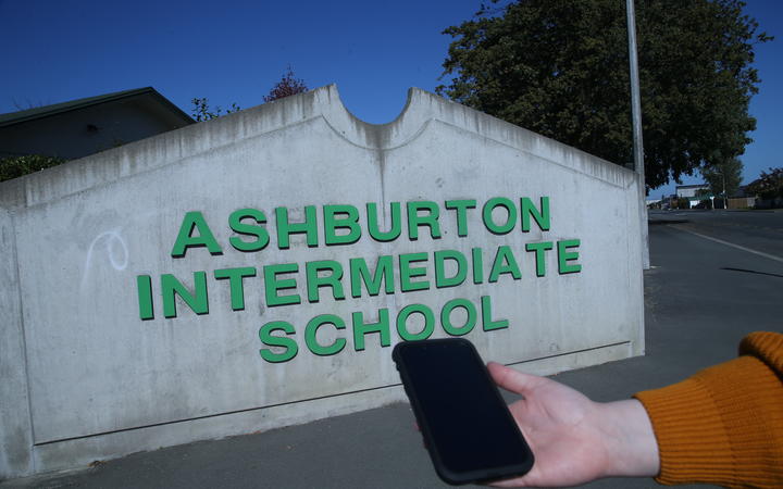 Ashburton Intermediate has a policy to "strongly discourage" pupils bringing cell phones to...