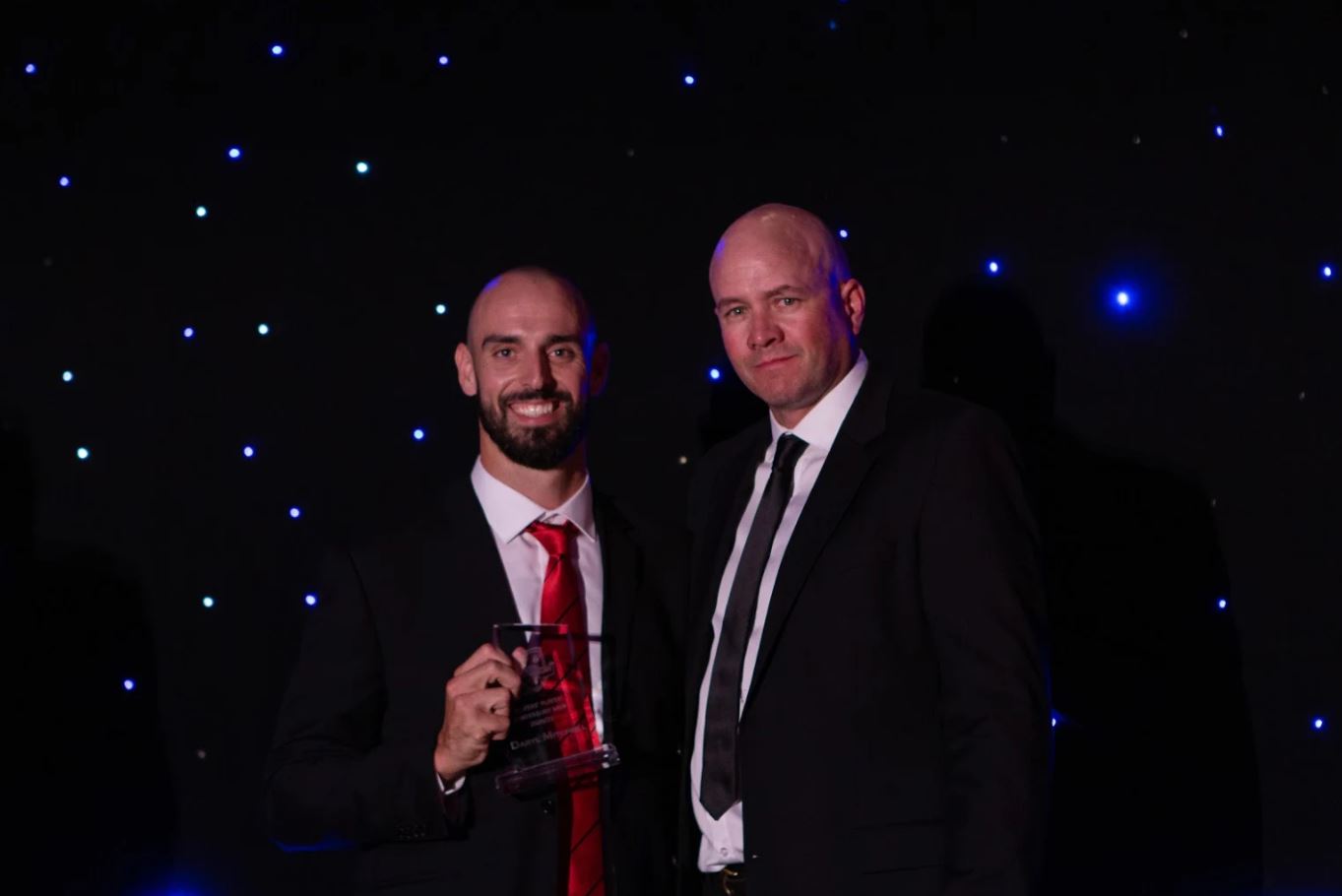 Daryl Mitchell with coach Peter Fulton. Photo: Callum Curnow