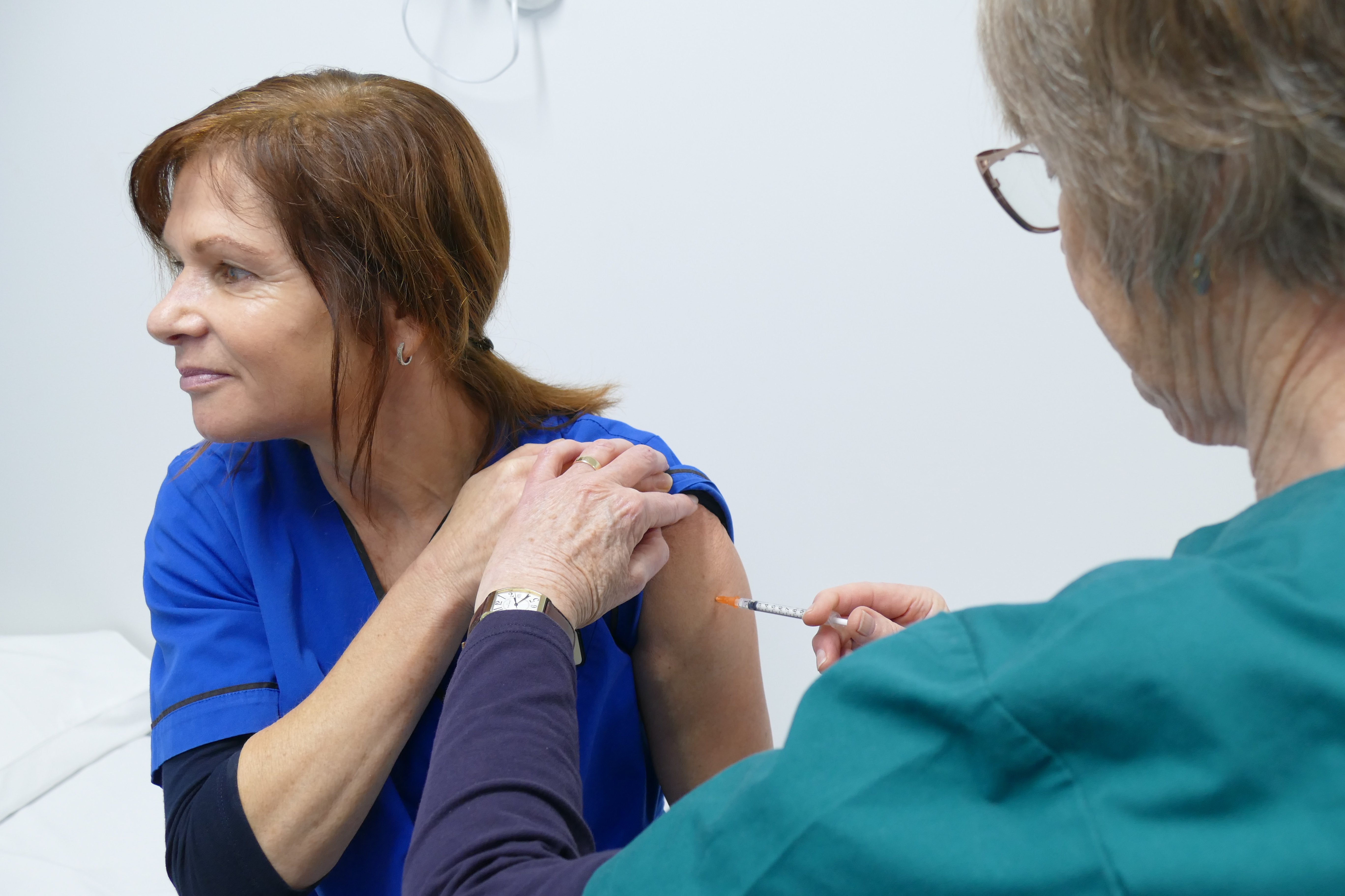 Queenstown Medical Centre nurse Suzie Hilton receives her first Covid-19 vaccination from...