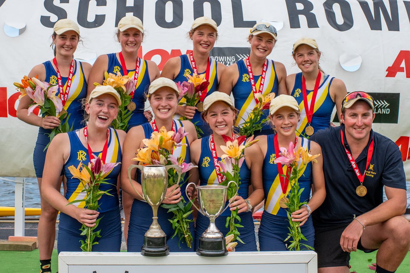 The triumphant Rangi Ruru under-18 eight with the school’s spoils of victory at the Maadi Cup...