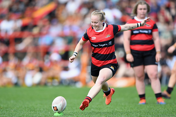 Kendra Cocksedge kicks a penalty for Canterbury in the Farah Palmer Cup. Photo: Getty Images