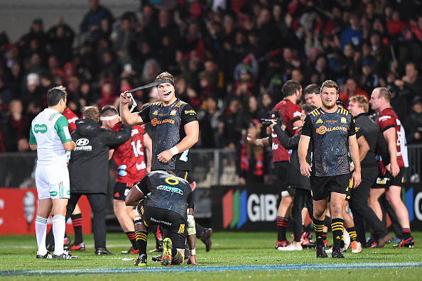 The dejected Chiefs at fulltime. Photo: Kai Schwoerer / Getty Images