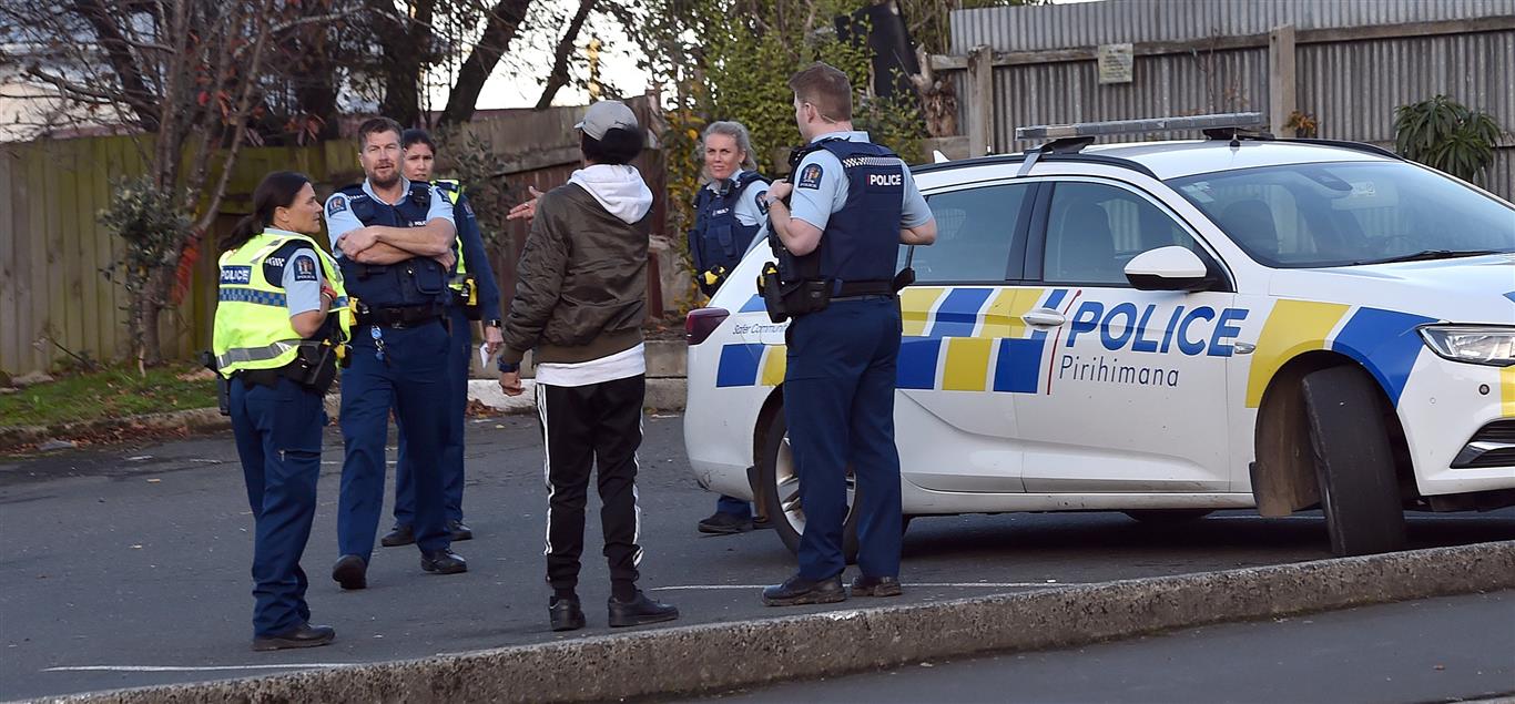 Police at the scene of an incident in Caversham this afternoon. Photo: Peter McIntosh