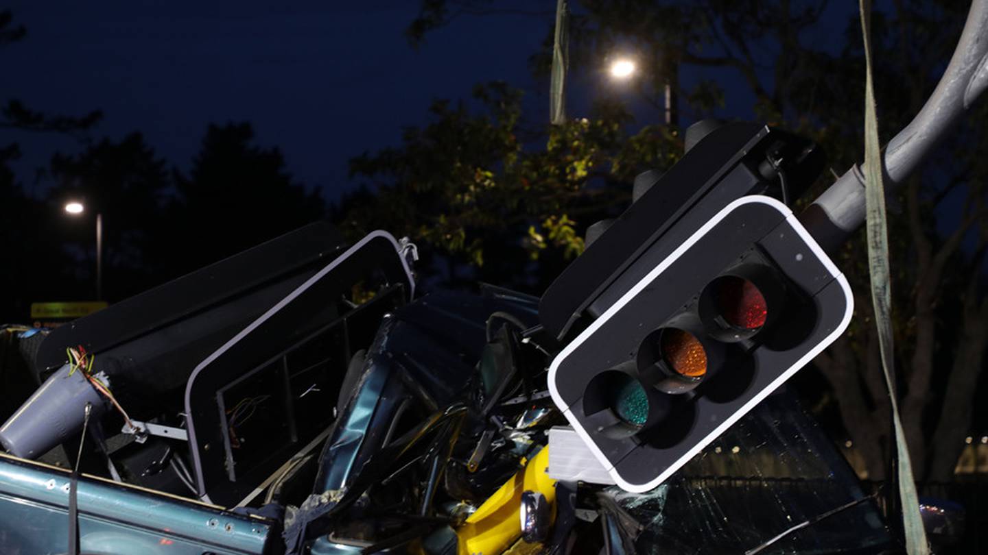 The mangled wreckage of the ute that crashed in the early hours of this morning on Great North Rd. Photo / Hayden Woodward