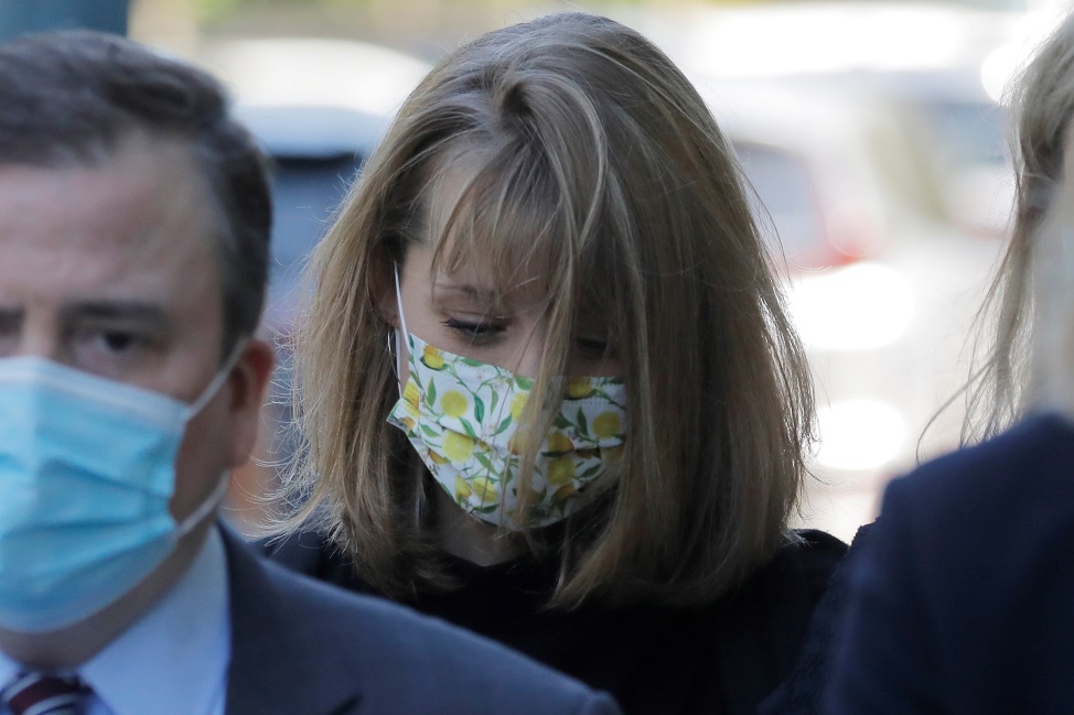 Allison Mack arrives with her lawyers at United States Federal Courthouse in Brooklyn to be...