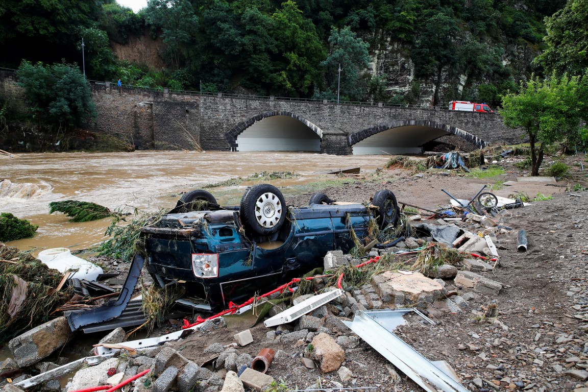 A car destroyed in the floods lies next to the Ahr River, following heavy rainfalls in Schuld,...