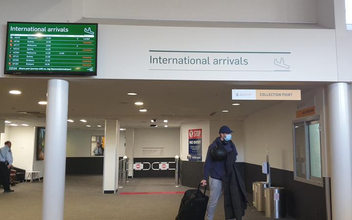 A display board at Queenstown Airport shows cancelled international flights. Photo: RNZ