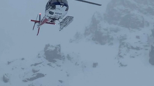 A helicopter airlifts out an injured skier caught in an avalanche on the Gamack Range. Photo:...