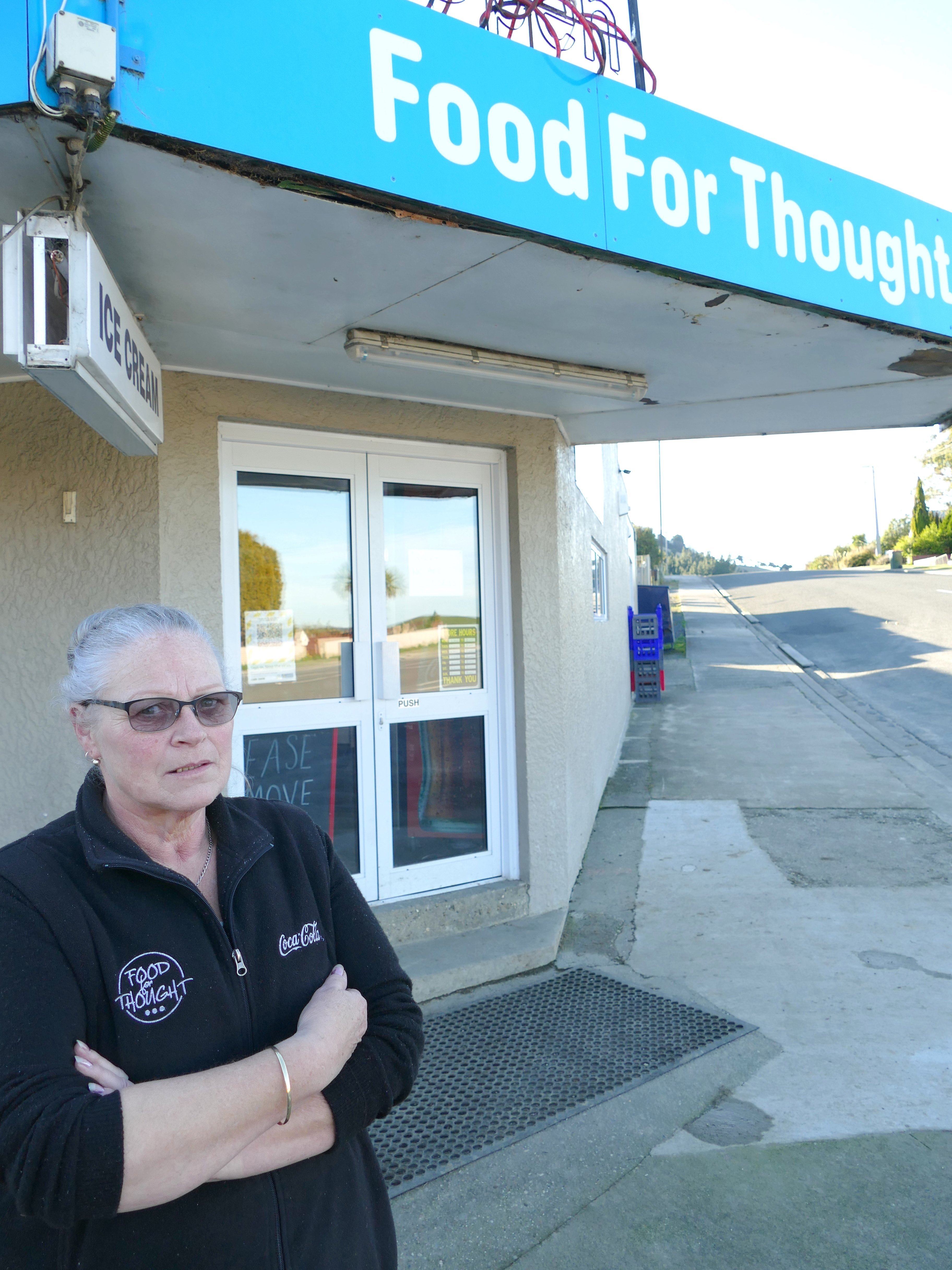 Clinton Food for Thought dairy owner Jo-anne Thomson stands outside her State Highway 1 store...