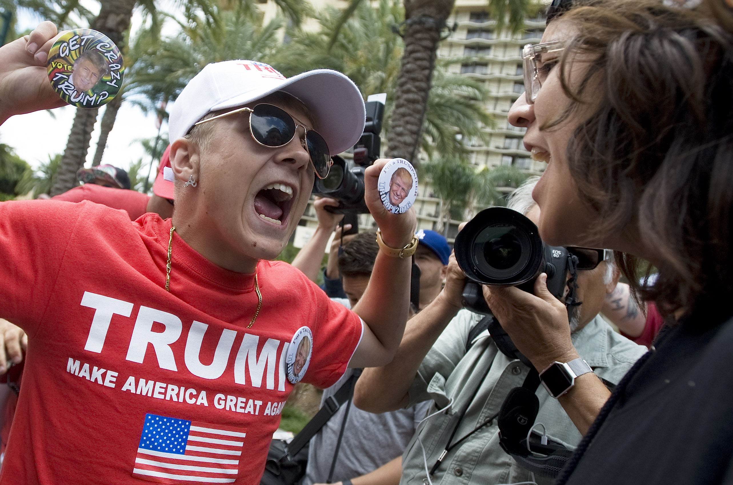 A Trump supporter and protestor engage in California. Photo: Getty Images 