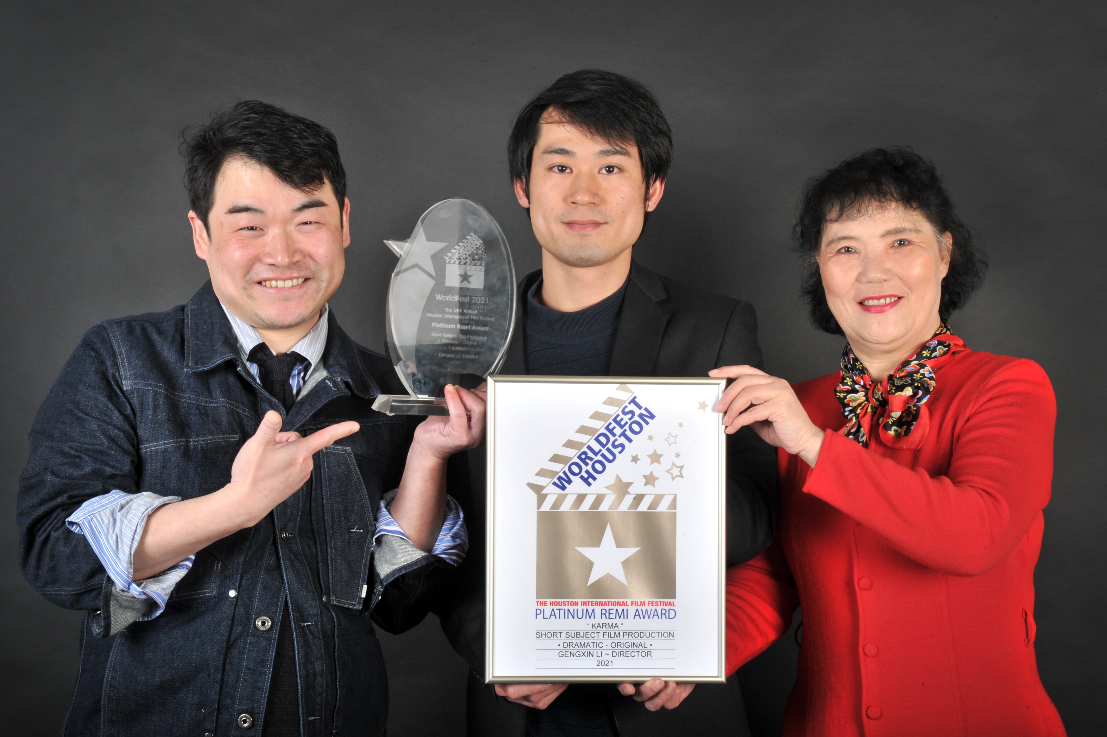 Dunedin-based director Sam Li (left), with producer Dingwei Lin and actor Weidi Xu, celebrate the...