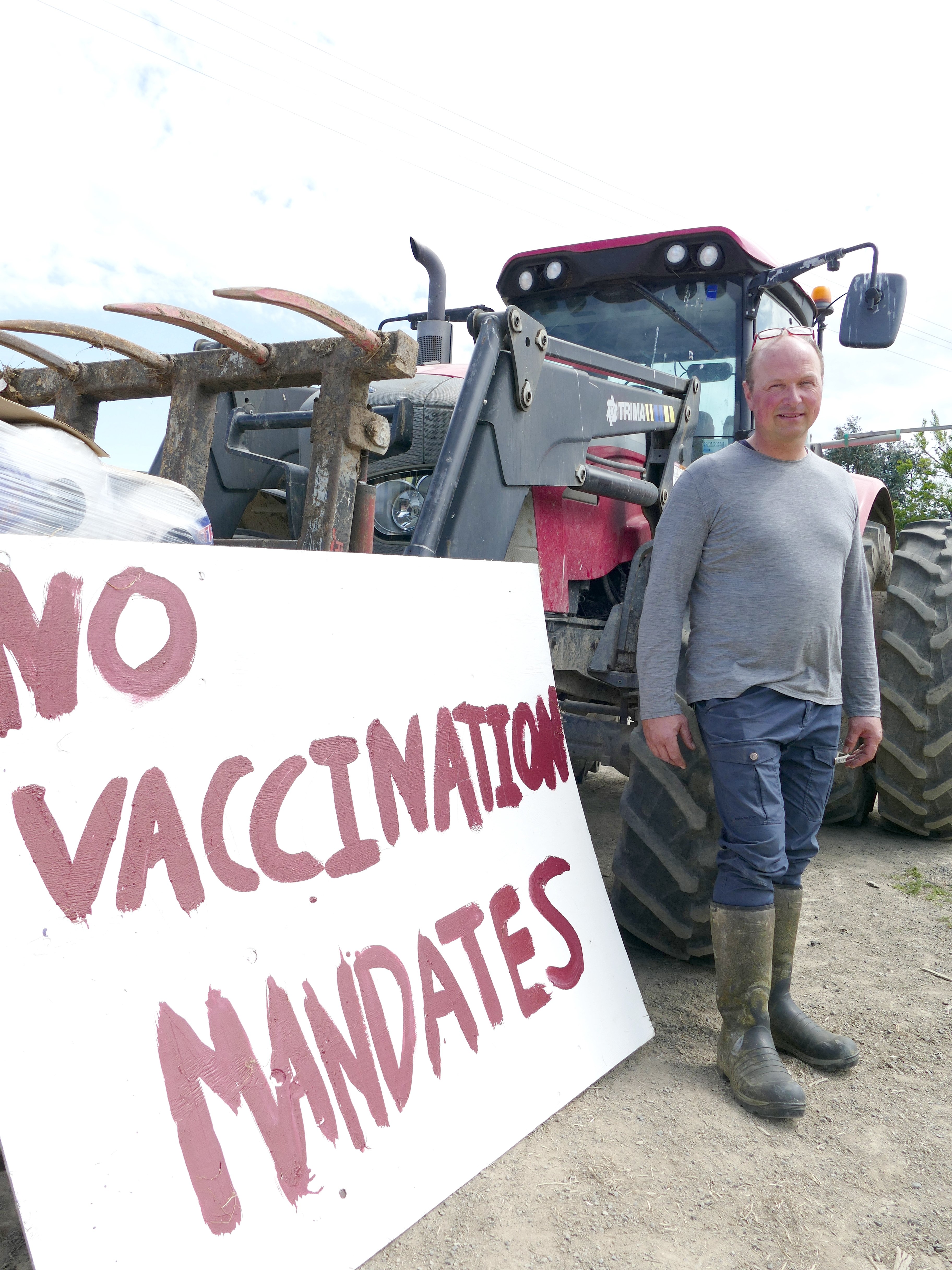 Anti-mandatory vaccination protest organiser Michael Magiera prepares tractor and signage at his...