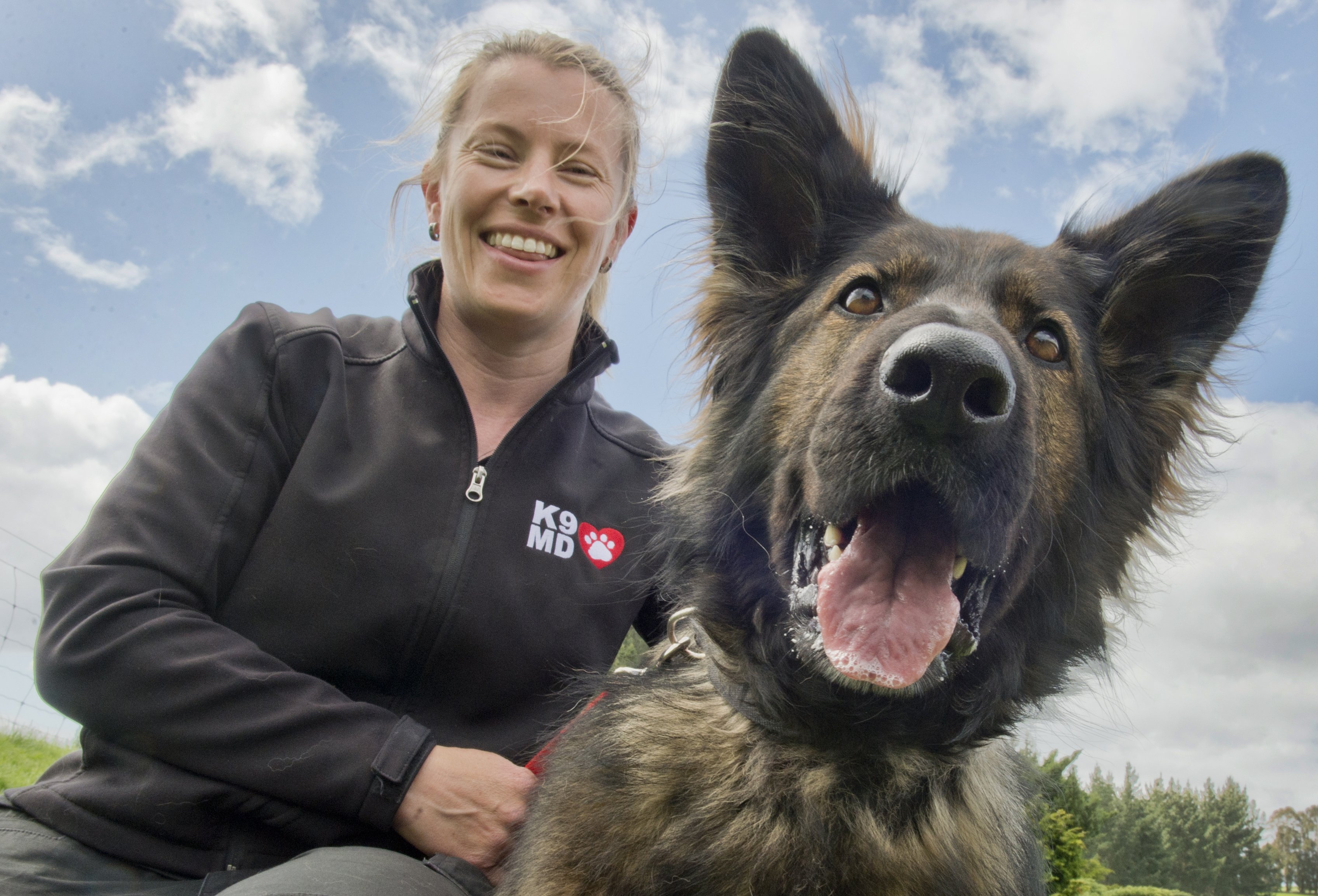 Frieda, the prostate cancer detecting dog, with K9 Medical Detection New Zealand senior trainer...