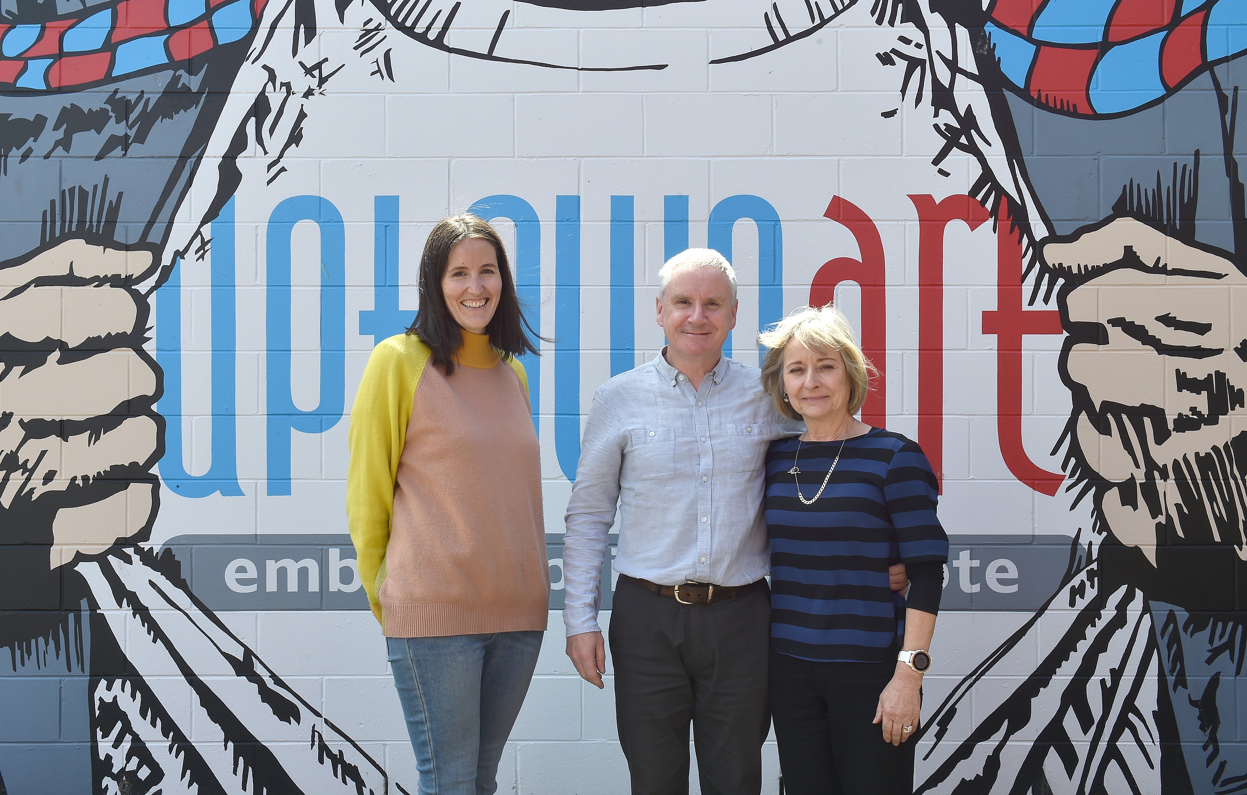 One of Uptown Art’s new owners, Alison Wenlock (left), pictured with the outgoing owners Stu and...