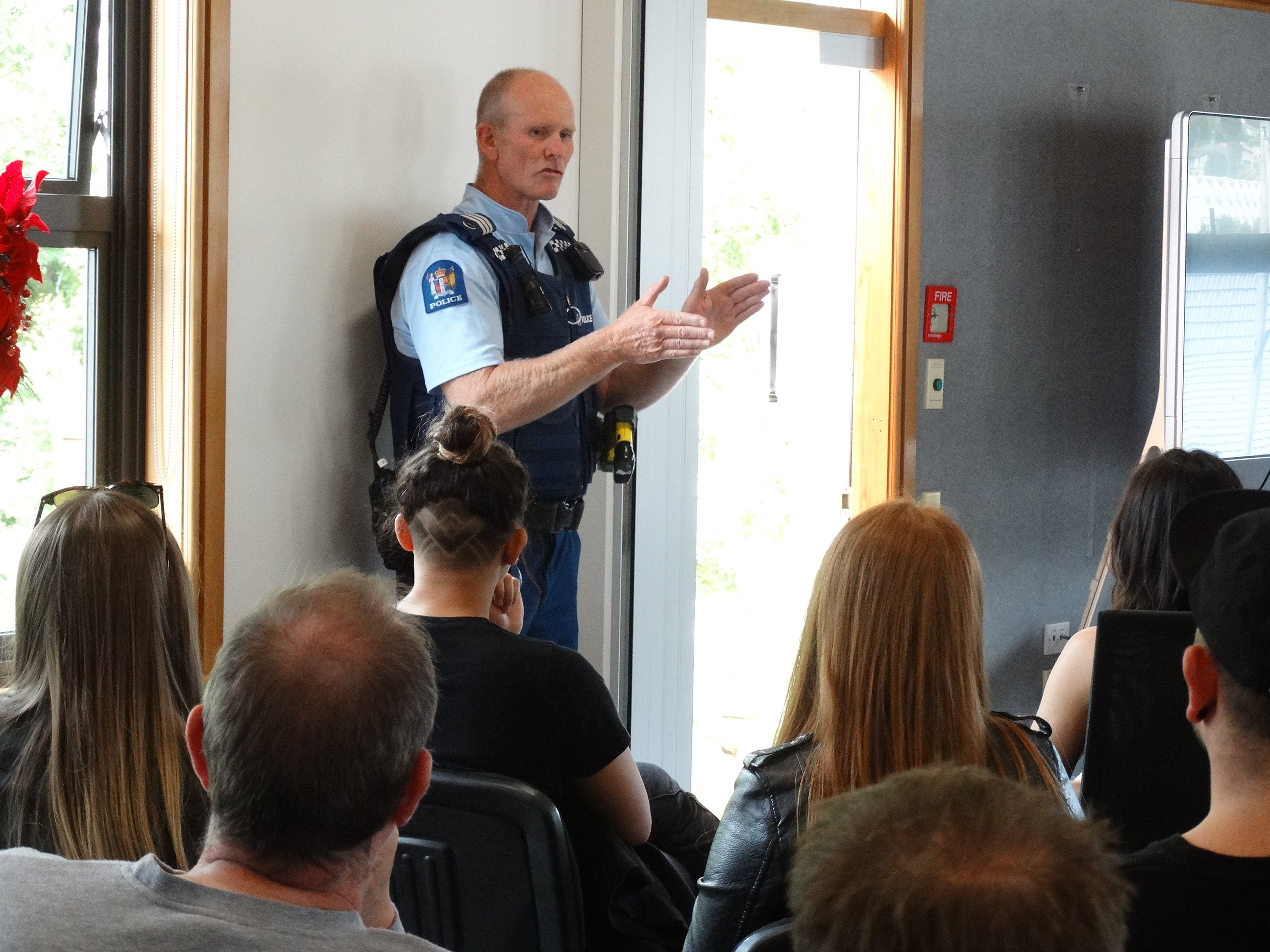 Sergeant Chris Brooks, of Queenstown, speaks to bar operators in Queenstown yesterday. PHOTO: GUY...