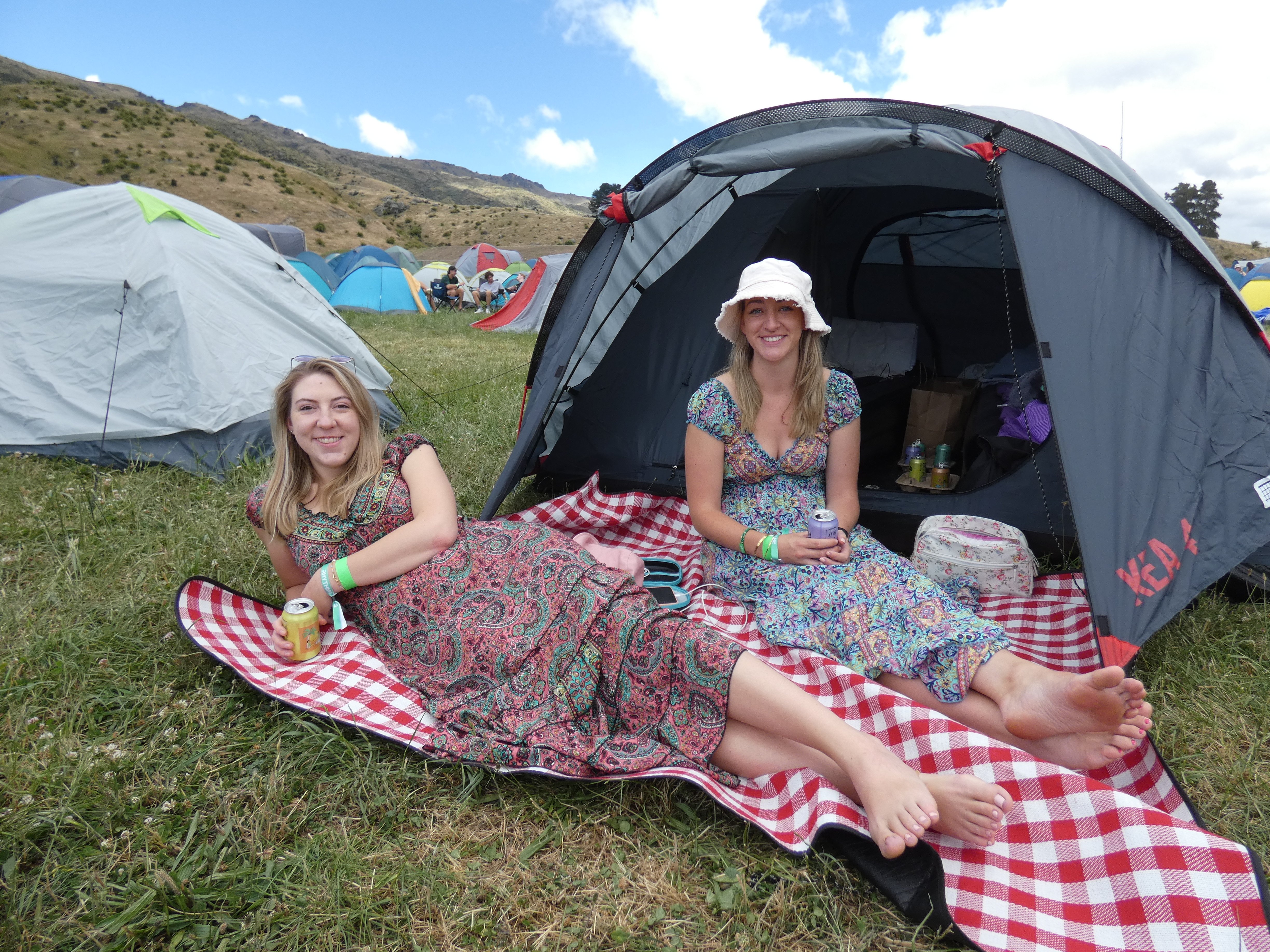 Canadian heathcare workers Sarah Meagher (left) and Emma Morgan soak up the atmosphere after what...