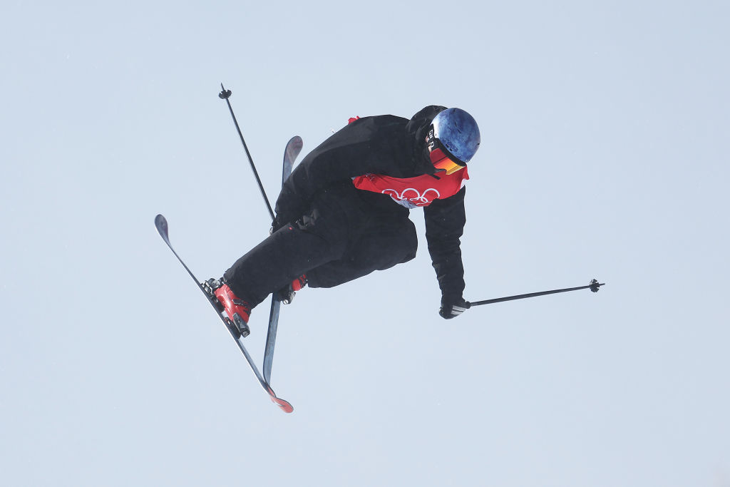 Nico Porteous performs a trick on his first run during the men's skiing halfpipe final at the...