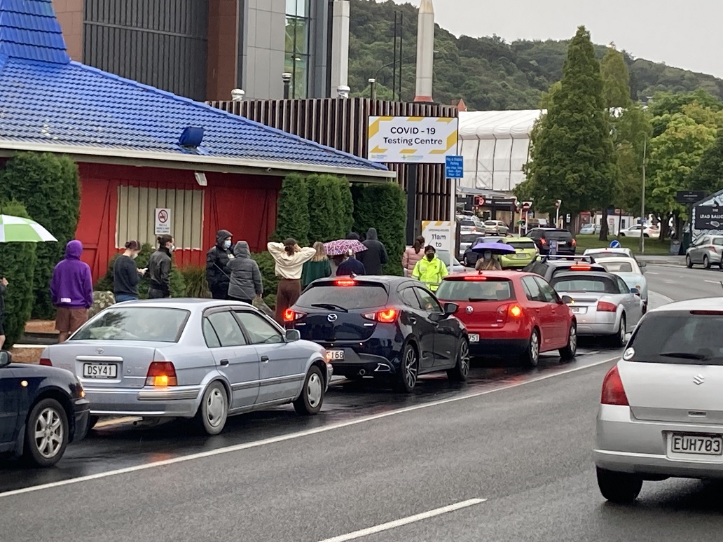 People wait in line for Covid testing near the University of Otago on Tuesday morning. Photo:...