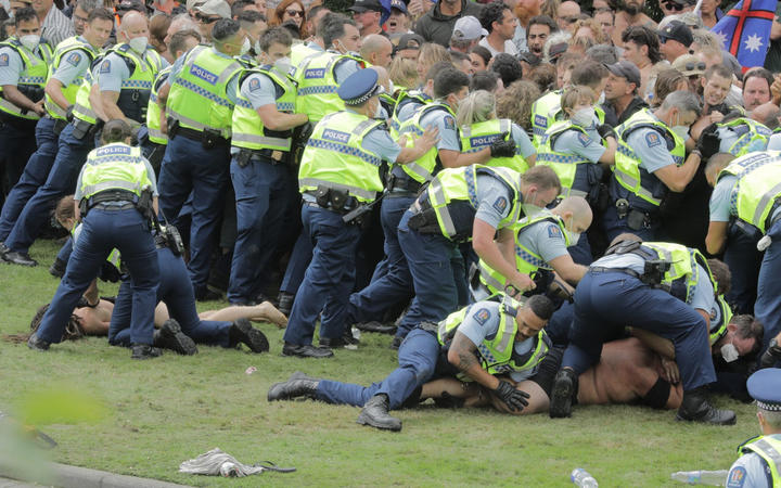 Police have made multiple arrests in an effort to remove protesters occupying Parliament's...