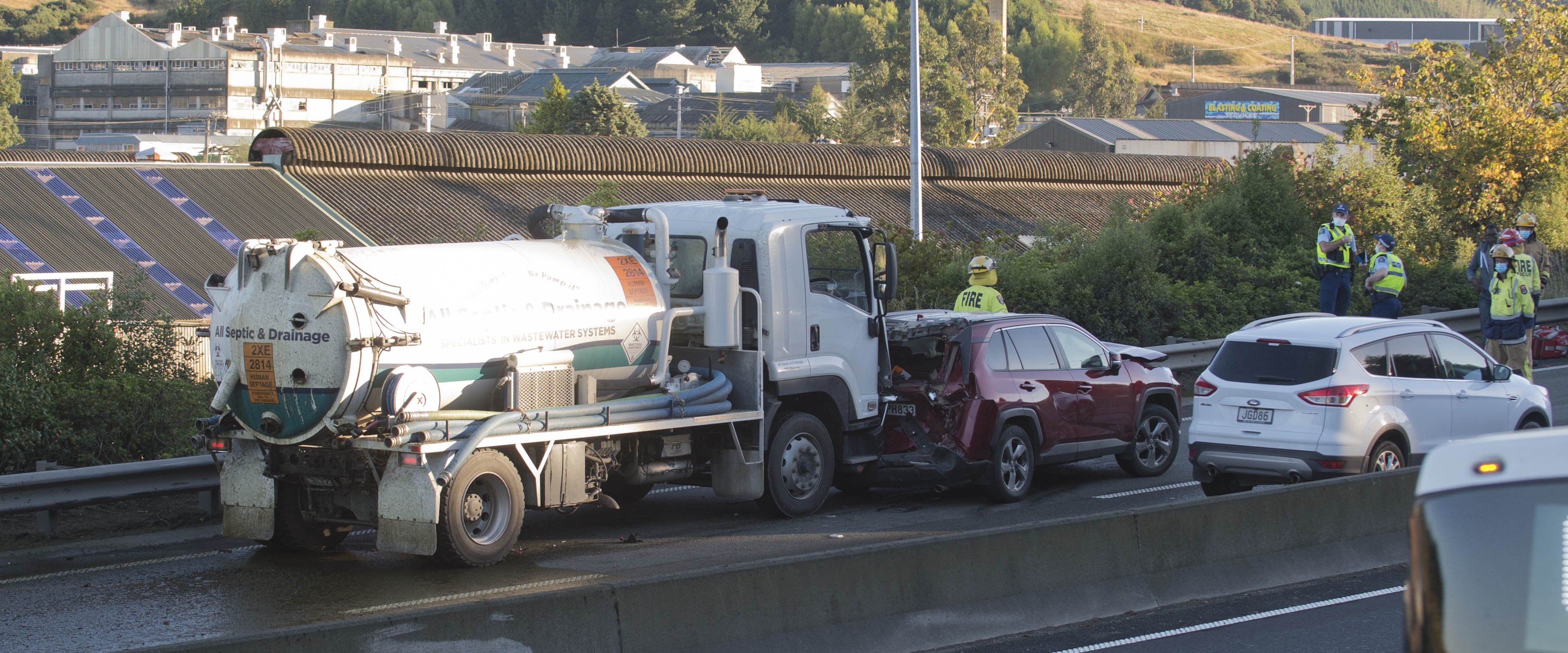 Emergency services at the scene of an accident on the north-bound lane of the Southern Motorway at Burnside this morning. PHOTO: GERARD O'BRIEN